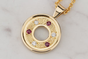 MODERN RUBY & DIAMOND PENDANT ON 18ct YELLOW GOLD