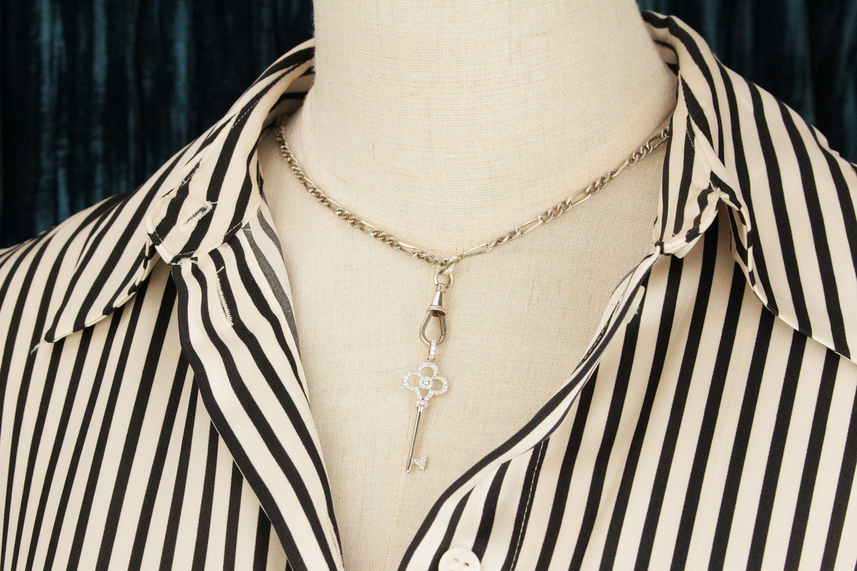 MODERN DIAMOND KEY PENDANT 18ct WHITE GOLD
