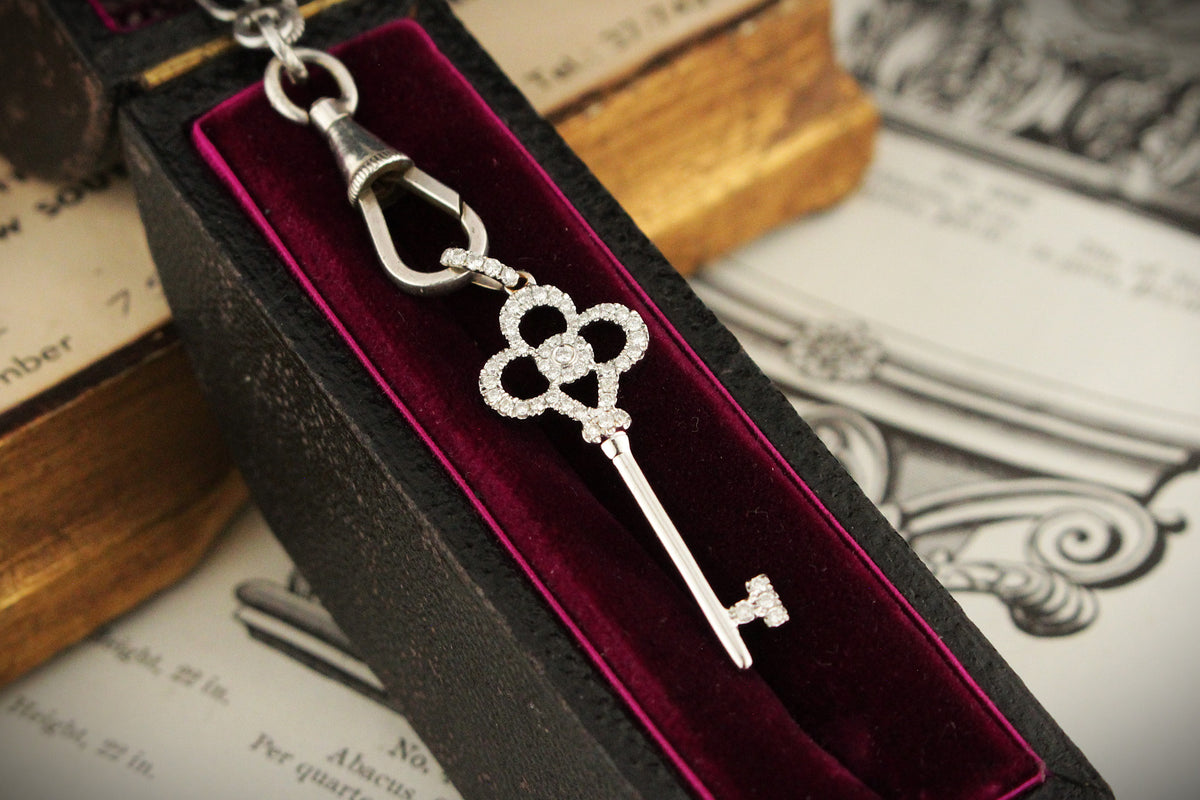 MODERN DIAMOND KEY PENDANT 18ct WHITE GOLD
