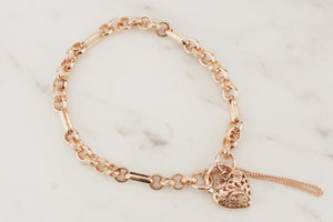 VINTAGE DAY & NIGHT BRACELET WITH FILIGREE HEART CLOSURE ON 9ct ROSE GOLD