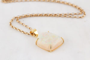 CONTEMPORARY SOLID FREE FORM OPAL PENDANT 18ct GOLD