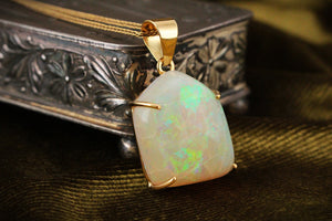 CONTEMPORARY SOLID FREE FORM OPAL PENDANT 18ct GOLD