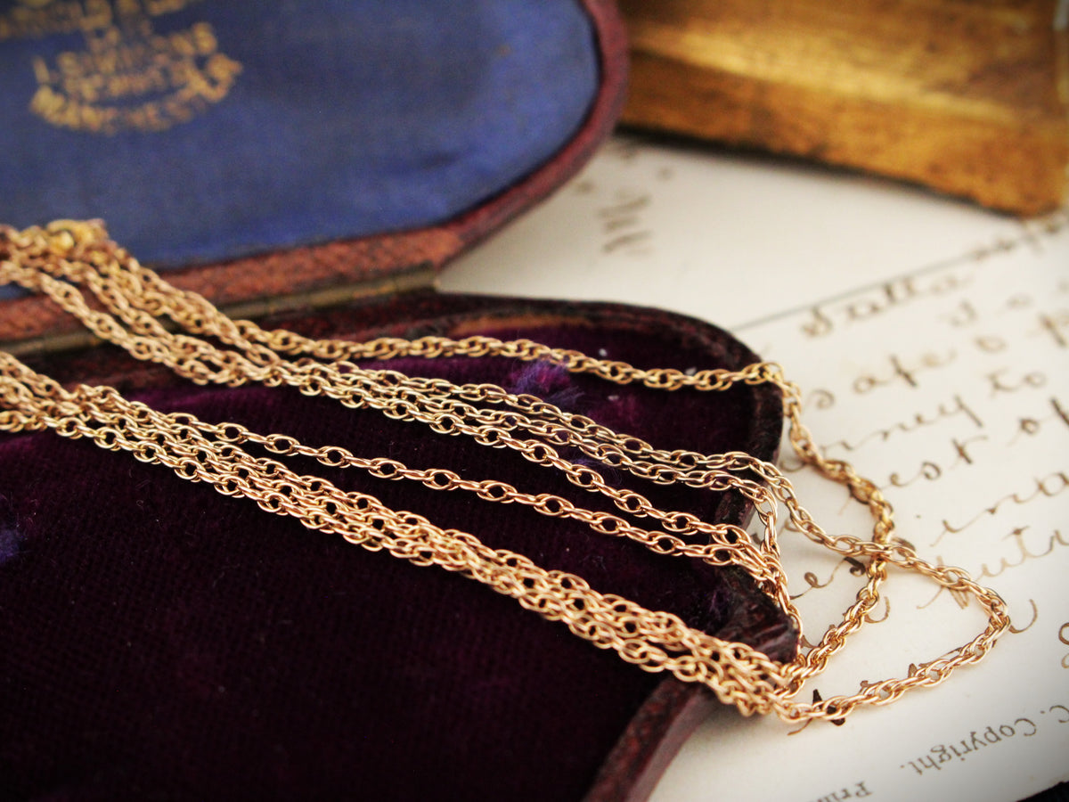 ANTIQUE EDWARDIAN 87cm MUFF CHAIN 9ct ROSE GOLD