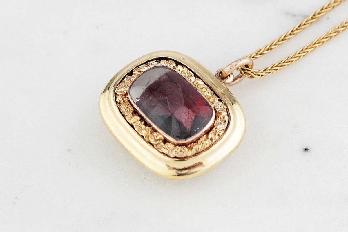 ANTIQUE MOURNING LOCKET WITH GARNET HEART 9ct GOLD