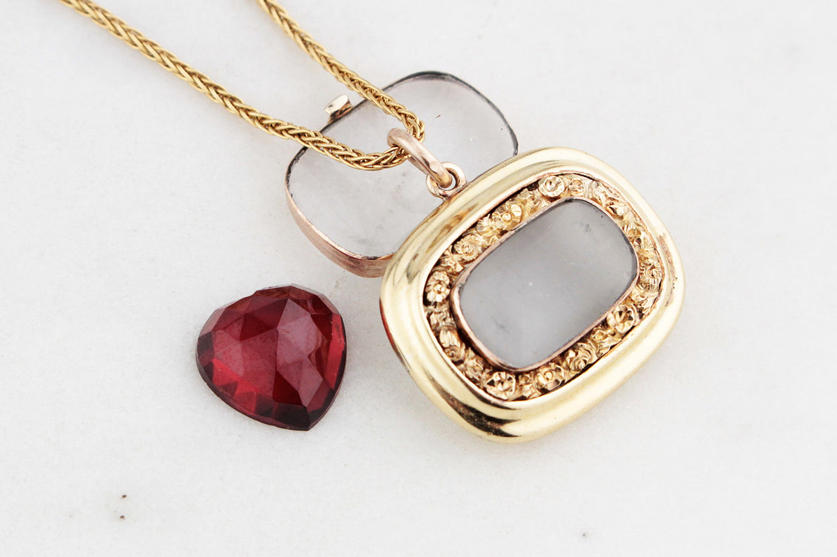 ANTIQUE MOURNING LOCKET WITH GARNET HEART 9ct GOLD