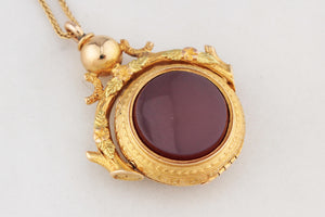 ANTIQUE VICTORIAN DOUBLE SIDED CARNELIAN SPINNING FOB LOCKET 15ct GOLD
