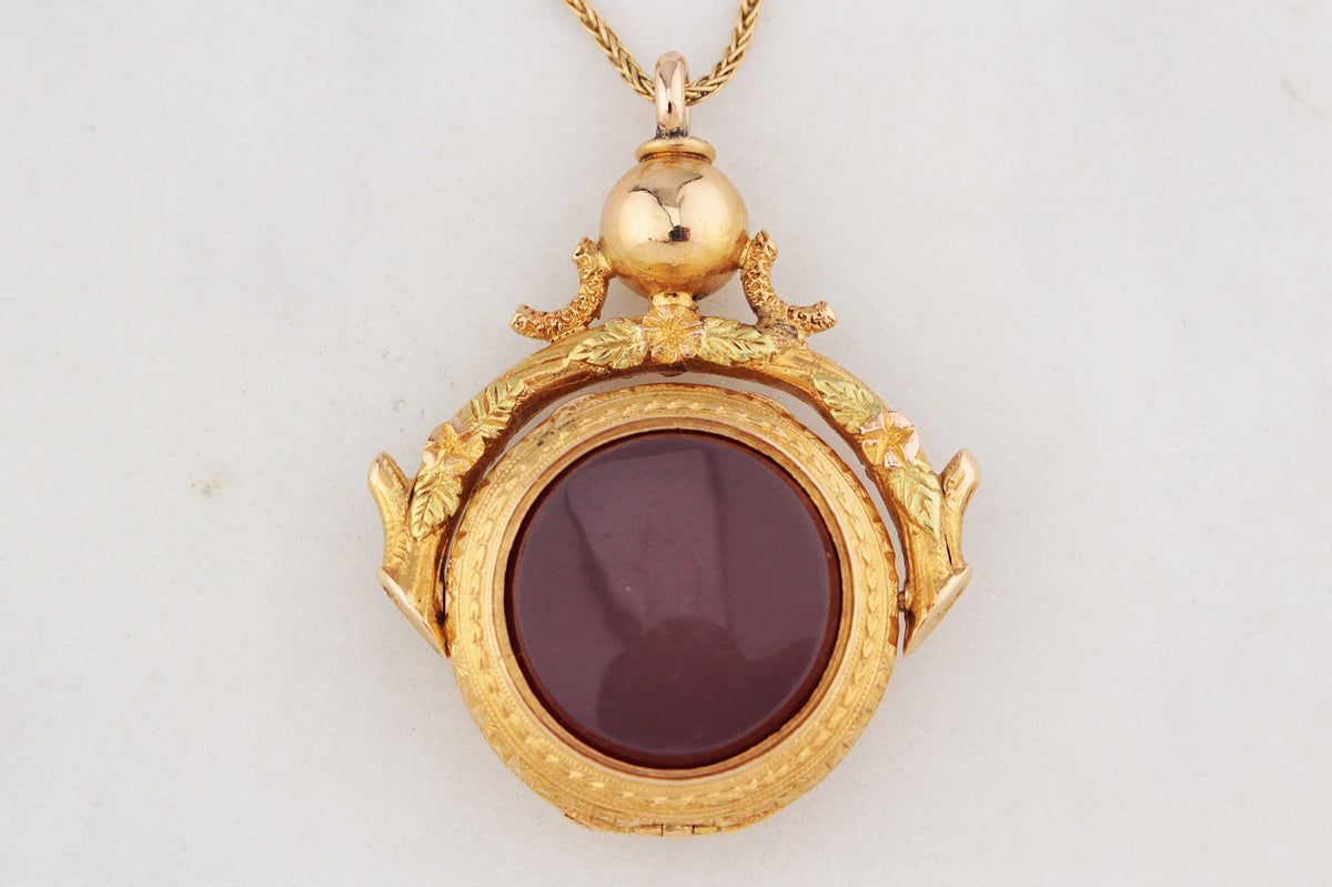 ANTIQUE VICTORIAN DOUBLE SIDED CARNELIAN SPINNING FOB LOCKET 15ct GOLD