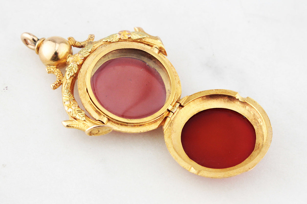 ANTIQUE VICTORIAN DOUBLE SIDED CARNELIAN SPINNING FOB LOCKET 15ct GOLD