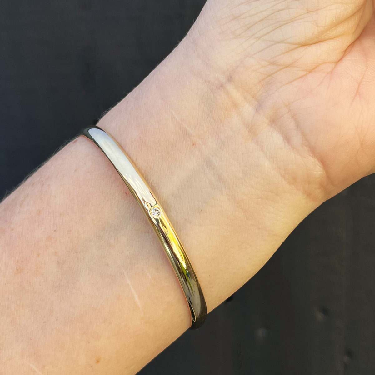 CONTEMPORARY DIAMOND &amp; SPINEL BANGLE 9ct GOLD