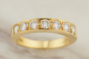 VINTAGE ESTATE .70ct SEVEN STONE DIAMOND HALF HOOP 18ct YELLOW GOLD