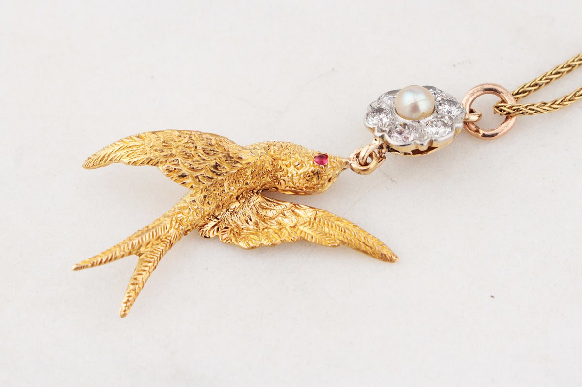 ANTIQUE DIAMOND, PEARL &amp; RUBY SWALLOW PENDANT 15 &amp; 18ct GOLD