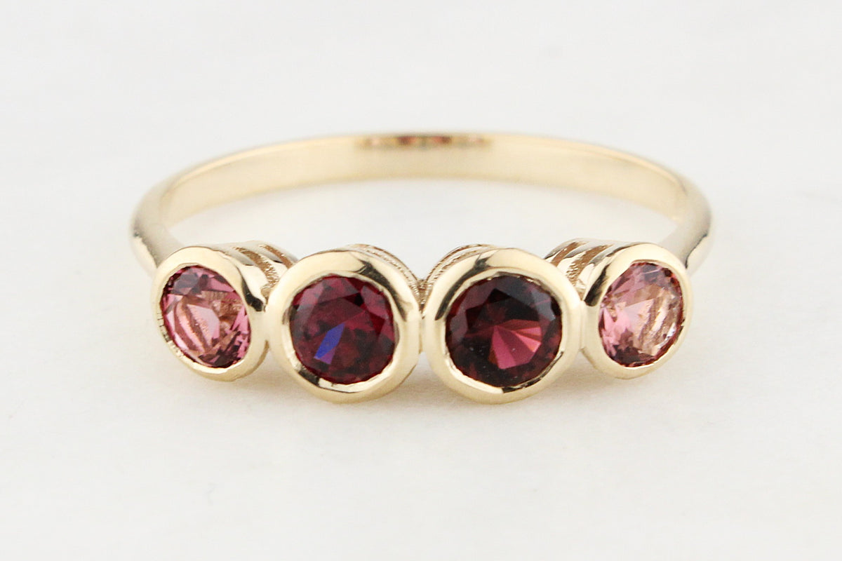 FOUR STONE PINK SAPPHIRE RING 9ct GOLD