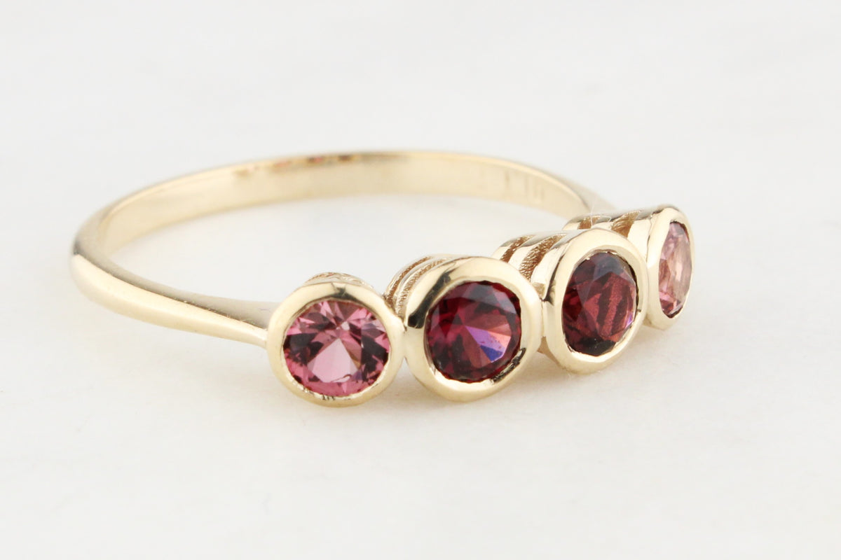 FOUR STONE PINK SAPPHIRE RING 9ct GOLD