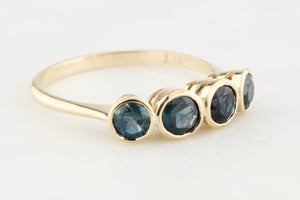 FOUR STONE TEAL SAPPHIRE RING 9ct GOLD