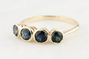 FOUR STONE TEAL SAPPHIRE RING 9ct GOLD