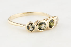 FOUR STONE GREEN SAPPHIRE RING 9ct GOLD