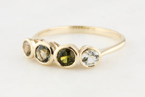 FOUR STONE GREEN SAPPHIRE RING 9ct GOLD