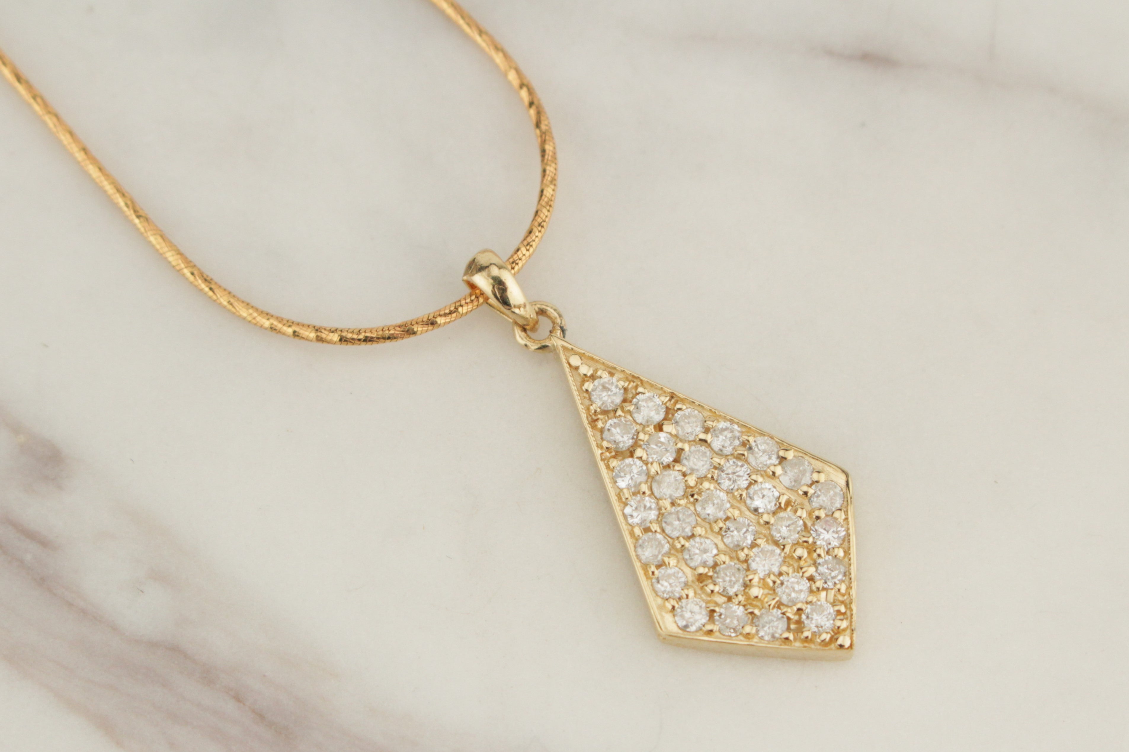 Contemporary diamond shop pendant necklace