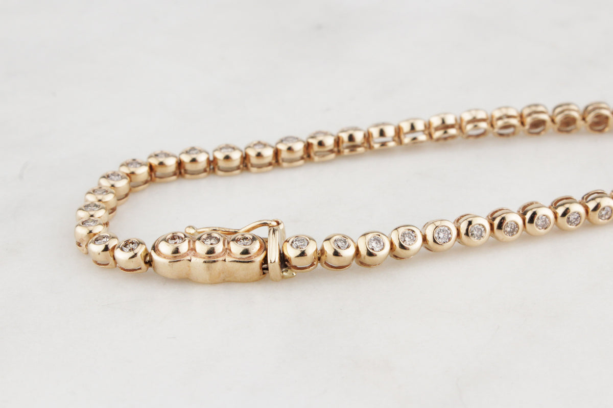 VINTAGE 1ct DIAMOND LINE BRACELET 9ct GOLD