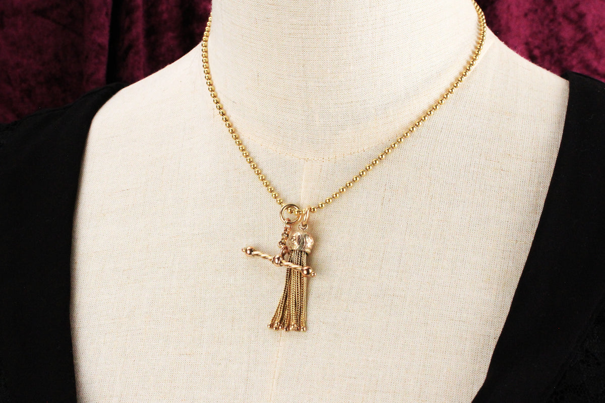 ANTIQUE SPINNING T-BAR PENDANT 9ct GOLD