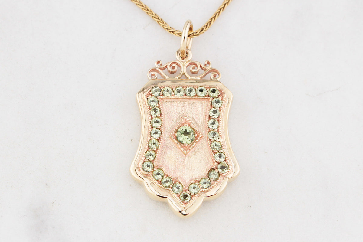 VINTAGE PERIDOT SHIELD PENDANT 9ct GOLD