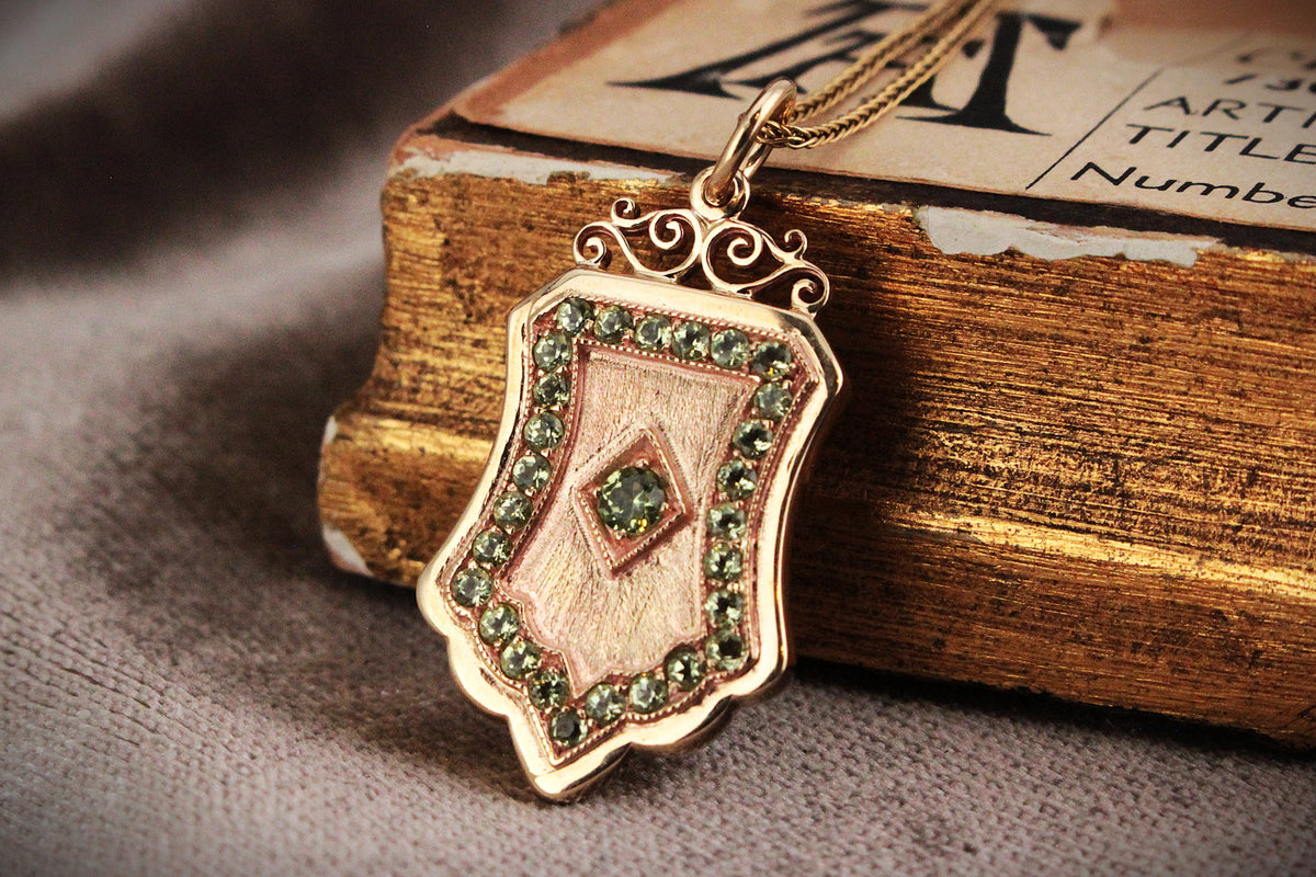 VINTAGE PERIDOT SHIELD PENDANT 9ct GOLD