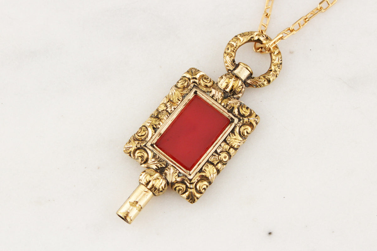 ANTIQUE VICTORIAN GILT CARNELIAN WATCH WINDER FOB