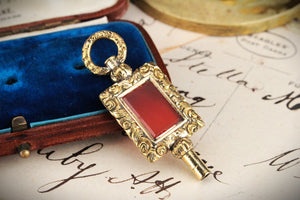 ANTIQUE VICTORIAN GILT CARNELIAN WATCH WINDER FOB