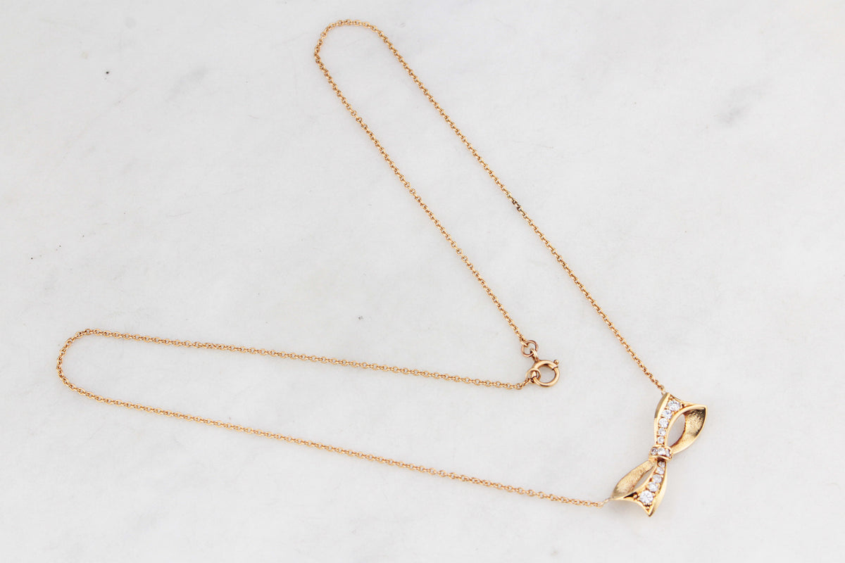 VINTAGE .32ct DIAMOND BOW NECKLACE 18ct & 9ct GOLD