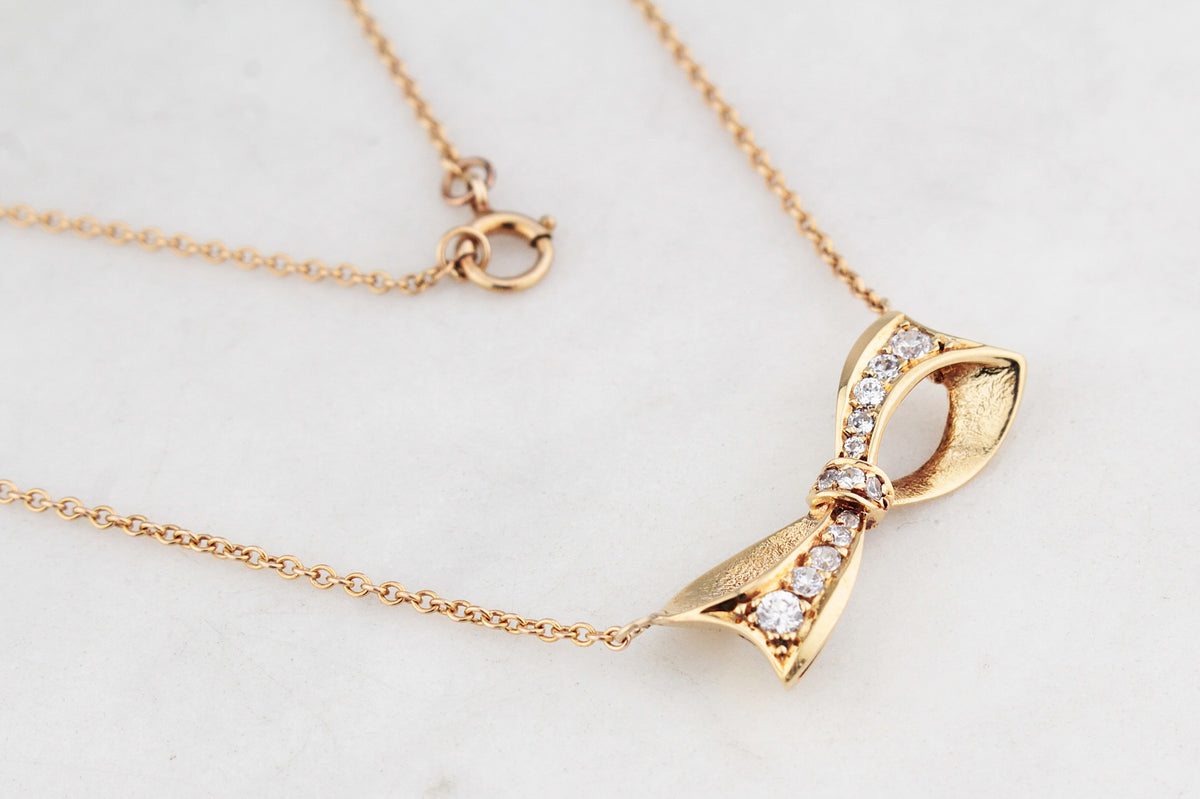 VINTAGE .32ct DIAMOND BOW NECKLACE 18ct & 9ct GOLD