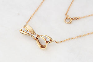 VINTAGE .32ct DIAMOND BOW NECKLACE 18ct & 9ct GOLD