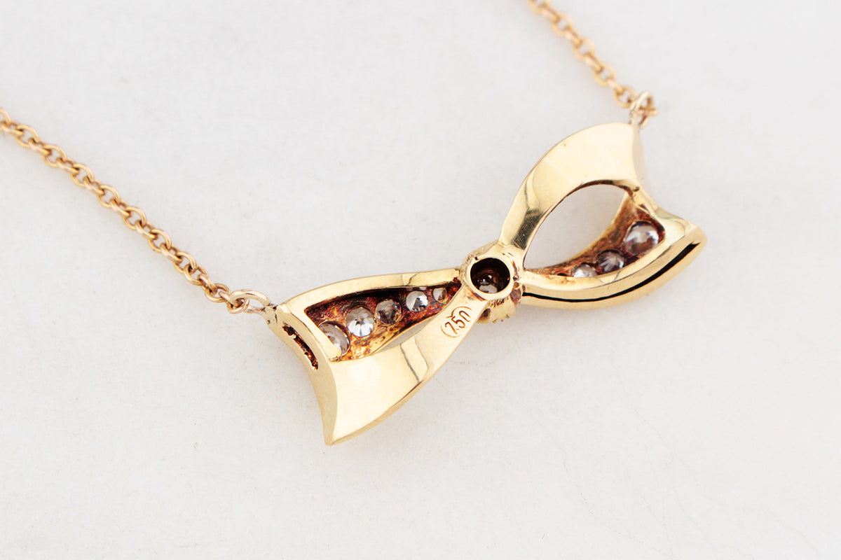 VINTAGE .32ct DIAMOND BOW NECKLACE 18ct & 9ct GOLD