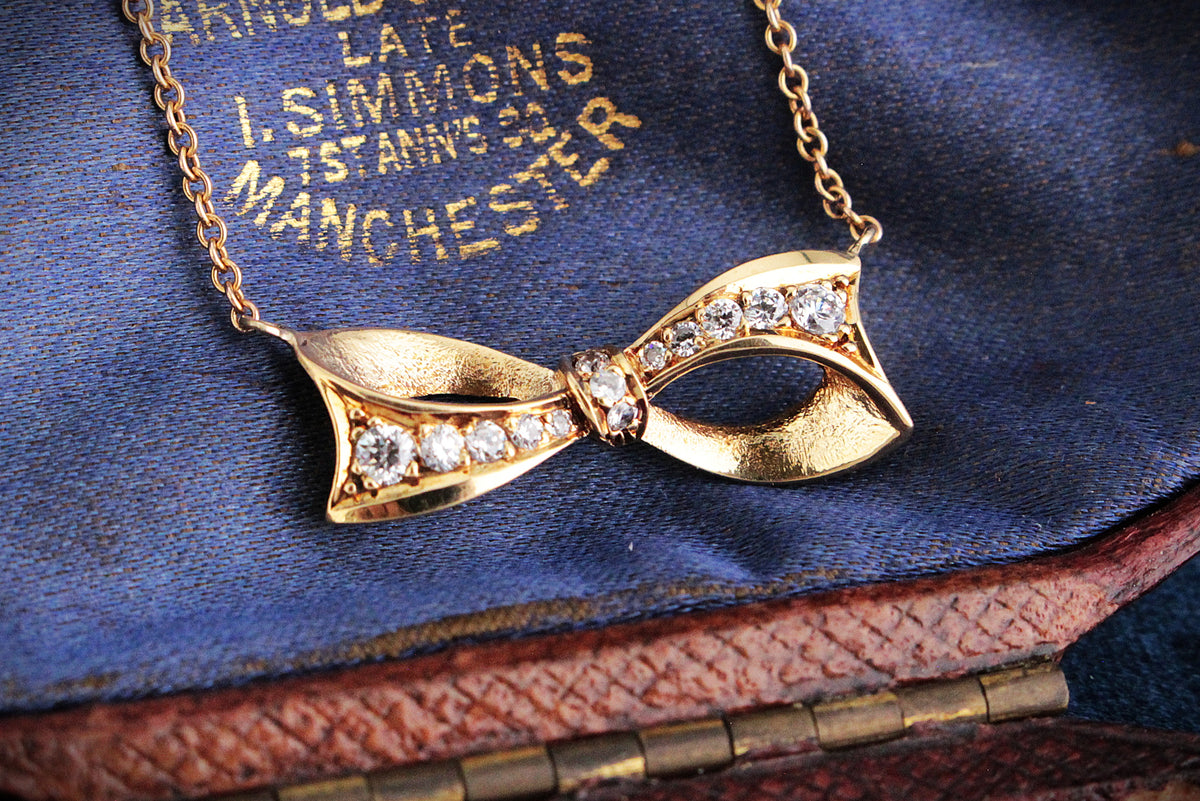VINTAGE .32ct DIAMOND BOW NECKLACE 18ct & 9ct GOLD