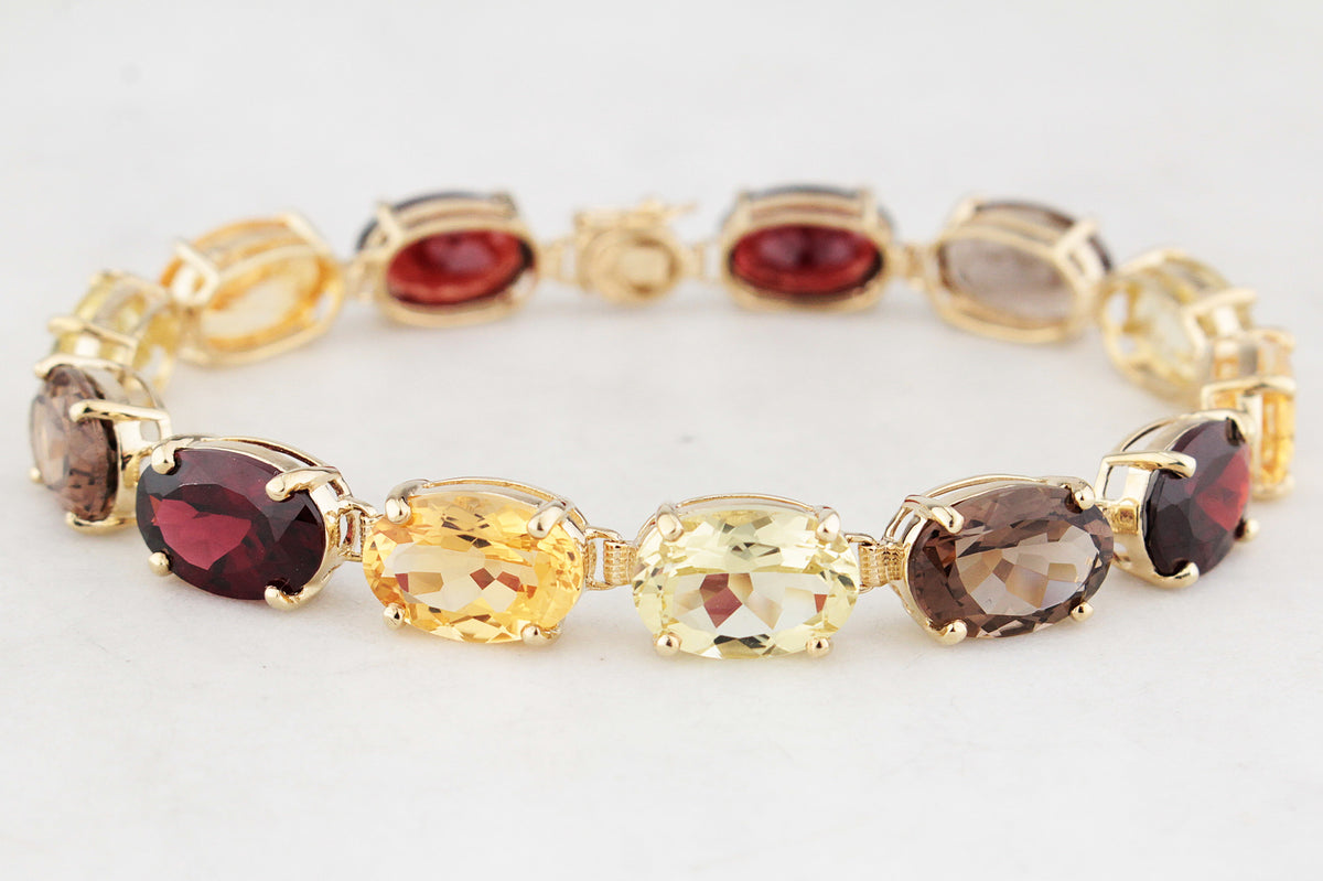 VINTAGE 45ct MIXED GEM BRACELET 9ct GOLD
