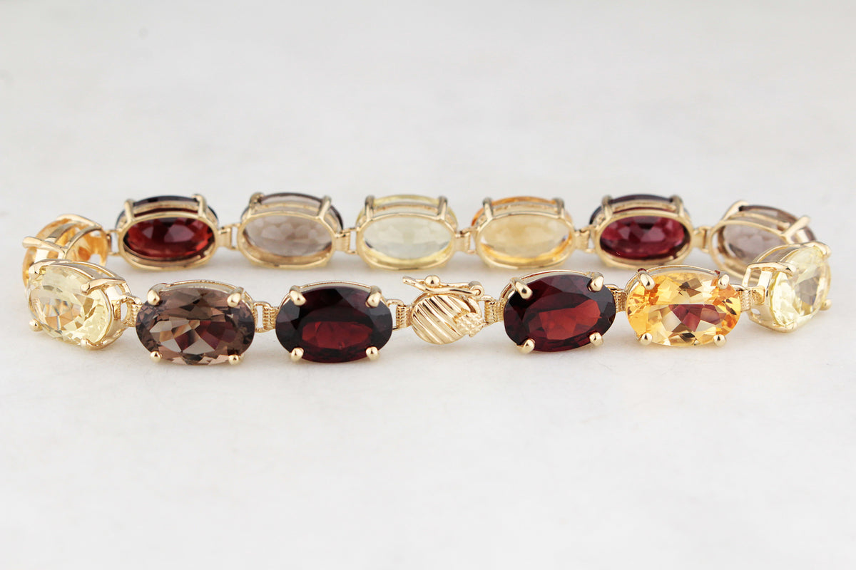 VINTAGE 45ct MIXED GEM BRACELET 9ct GOLD