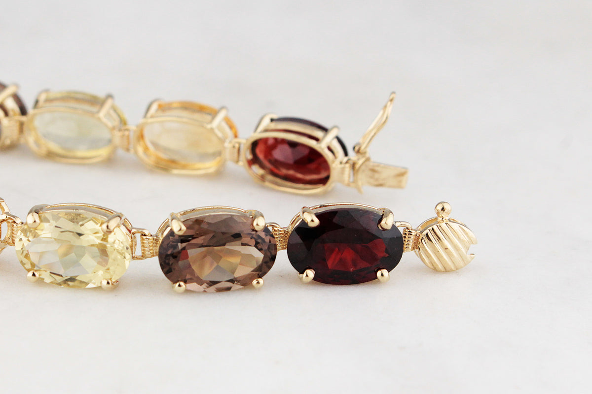 VINTAGE 45ct MIXED GEM BRACELET 9ct GOLD