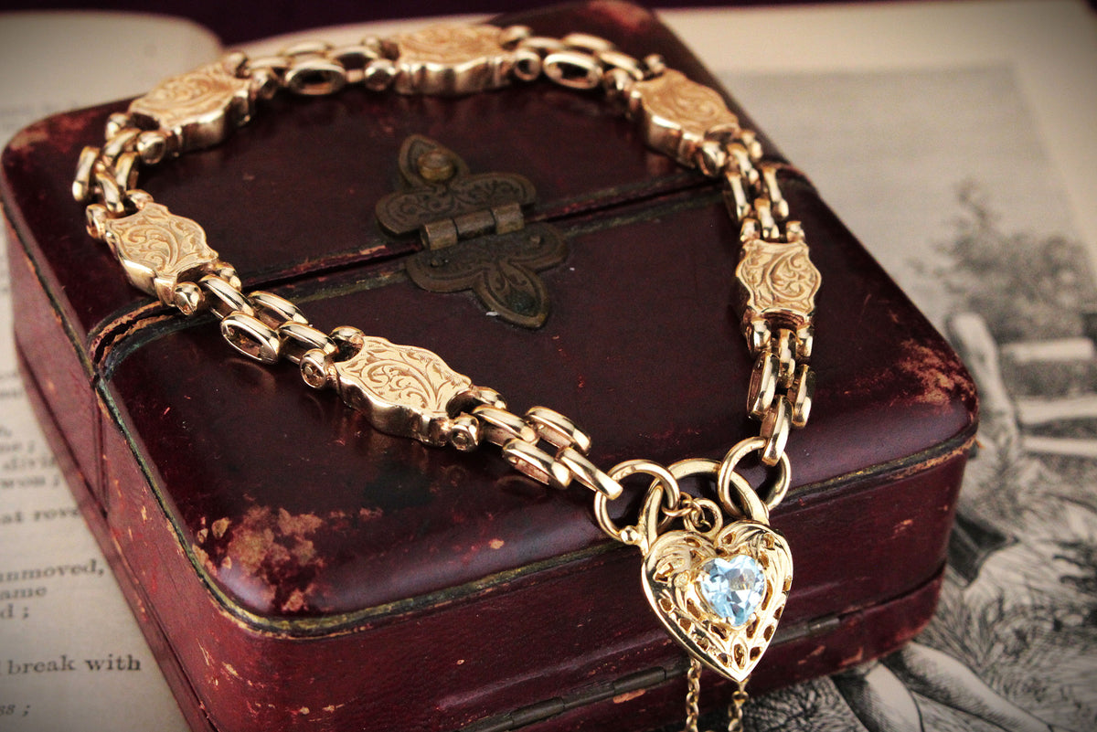 ANTIQUE EDWARDIAN ETCHED LINK BRACELET WITH FILIGREE TOPAZ HEART 9ct GOLD