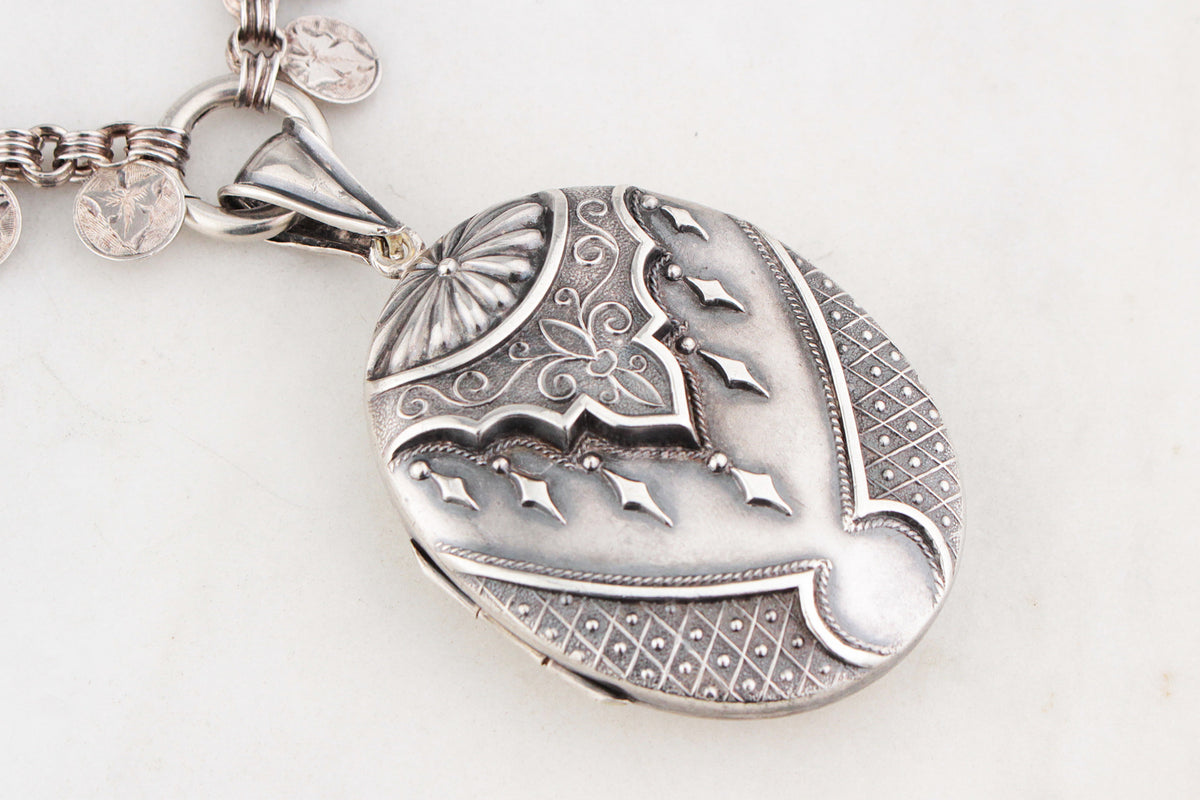ANTIQUE STERLING SILVER AESTHETIC MOVEMENT BOOK CHAIN AND LOCKET