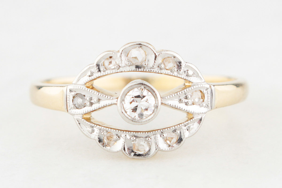ANTIQUE DIAMOND HALO RING IN 18ct GOLD