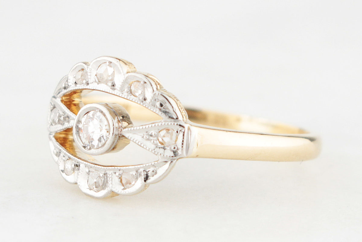 ANTIQUE DIAMOND HALO RING IN 18ct GOLD