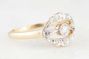 ANTIQUE DIAMOND HALO RING IN 18ct GOLD