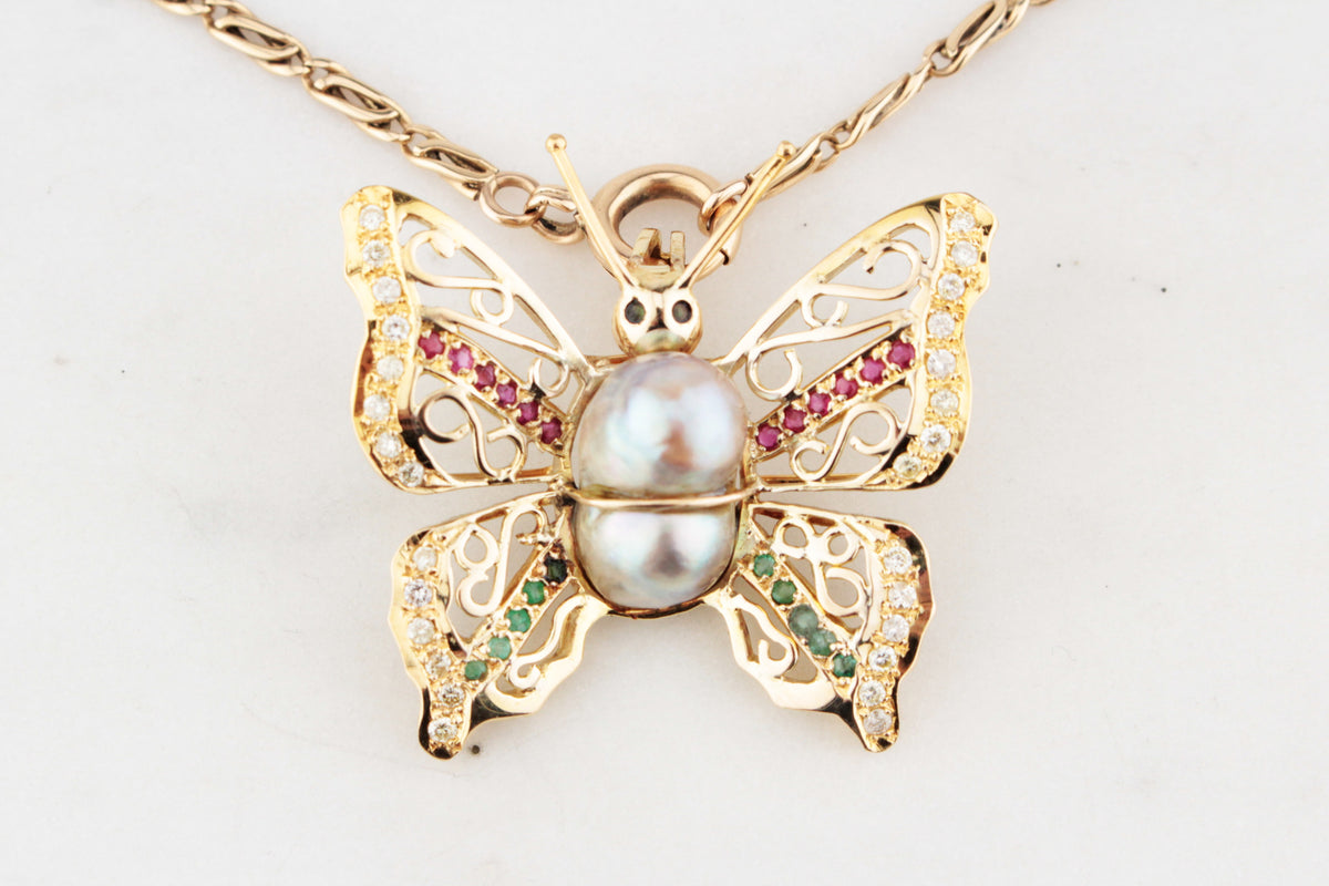 VINTAGE BUTTERFLY PENDANT WITH EMERALDS, RUBIES, DIAMONDS &amp; PEARL 14ct GOLD