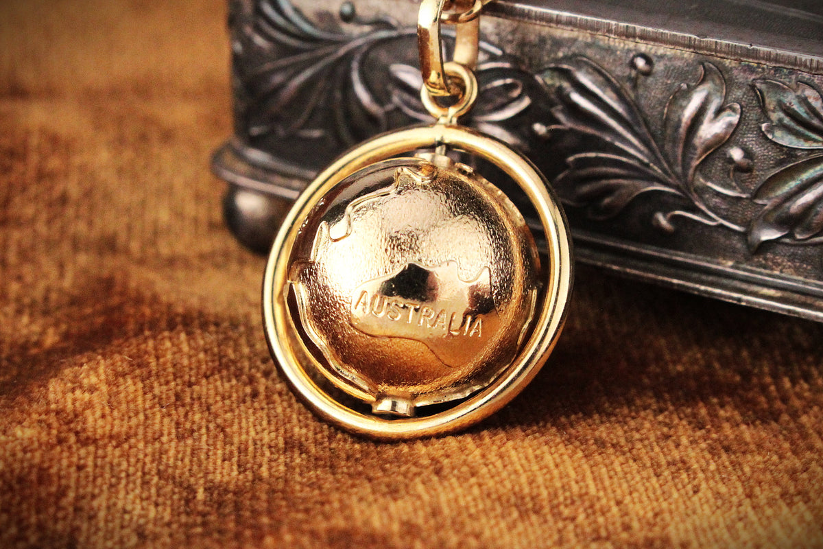 VINTAGE SPINNING GLOBE PENDANT 9ct GOLD