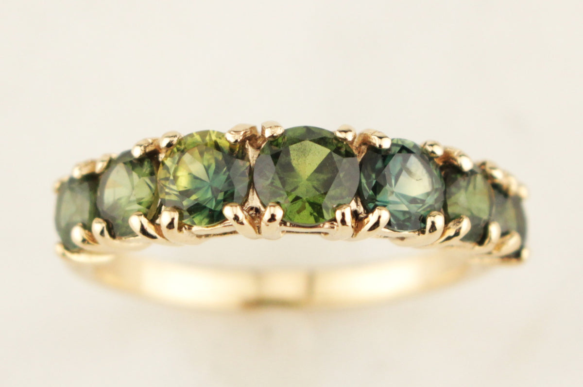 R&amp;V BESPOKE SEVEN STONE SAPPHIRE HALF HOOP RING 9ct YELLOW GOLD