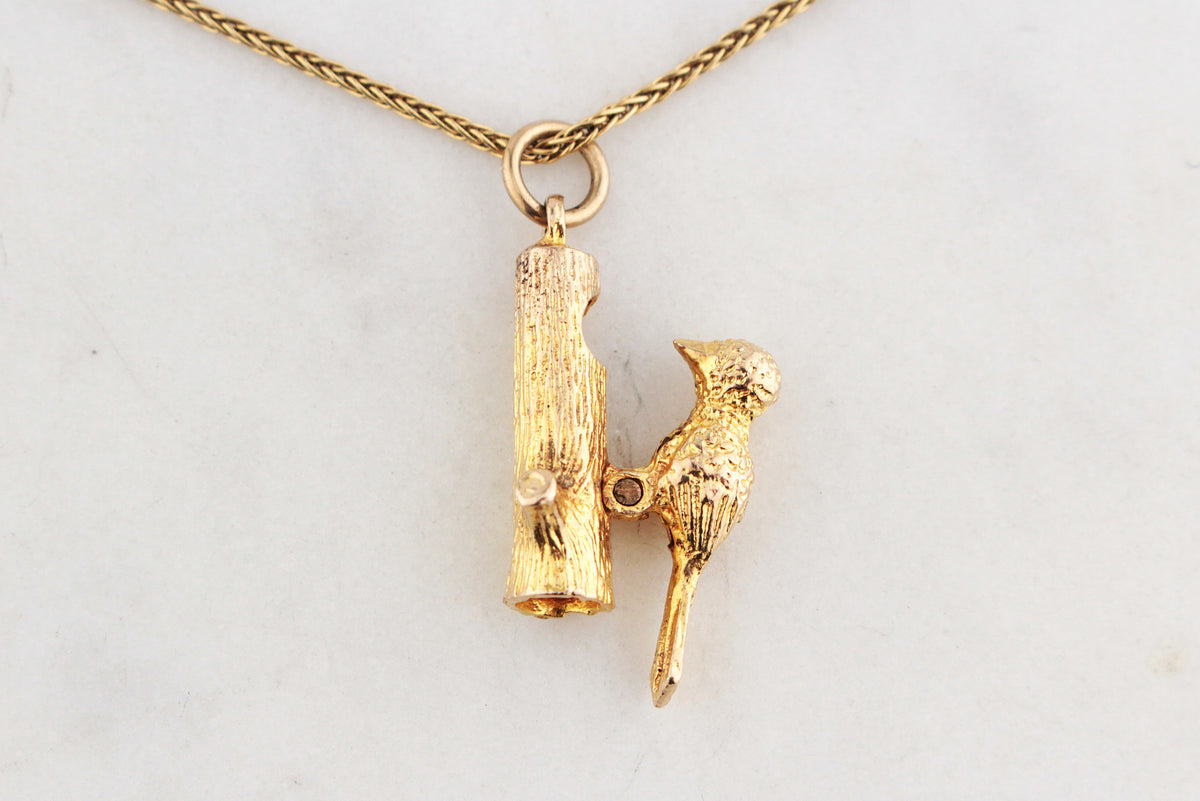 RETRO ARTICULATED WOODPECKER CHARM 9ct GOLD