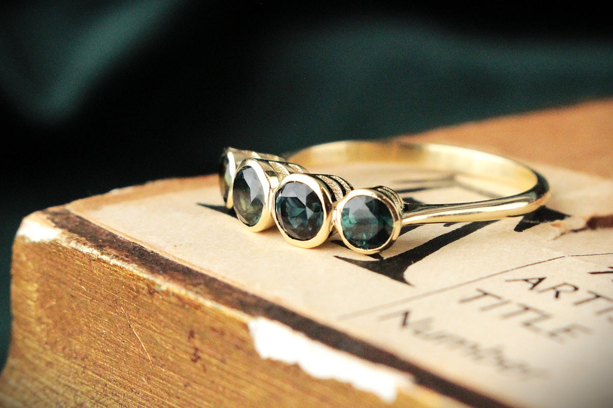 BESPOKE FOUR-STONE SAPPHIRE RING 14ct GOLD