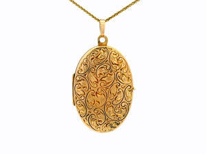 ANTIQUE ENGRAVED OVAL LOCKET 9ct GOLD