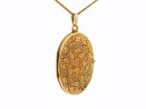 ANTIQUE ENGRAVED OVAL LOCKET 9ct GOLD