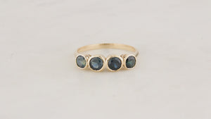 FOUR STONE TEAL SAPPHIRE RING 9ct GOLD