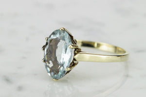 VINTAGE ESTATE AQUAMARINE RING ON 9ct YELLOW GOLD